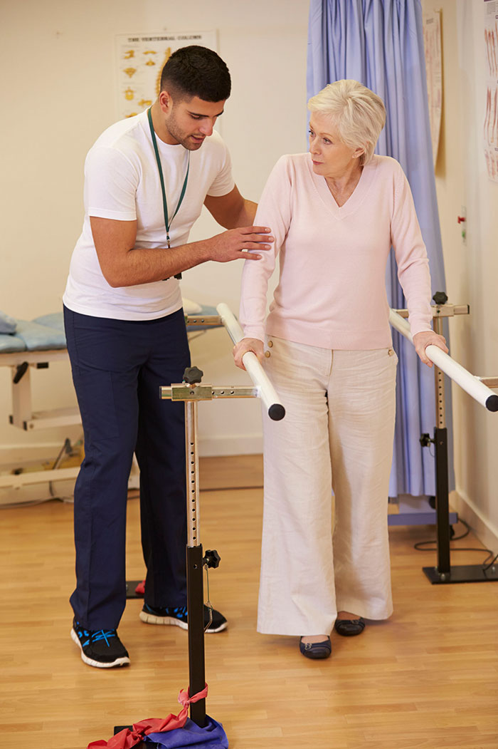 doctor rehabbing patient